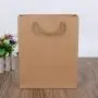 China Manufacturer Custom Logo Brown Kraft Paper Packaging Bags Shopping Paper Bags With Handles