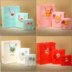 Hot Selling Colorful Printing Paper Bag For Gift Packaging With Handles And Custom Logo