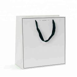 Low Price Good Quality High-capacity Handmade White Paper Shopping Gift Packaging Bag With Custom Logo