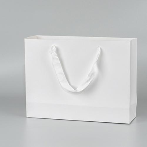 Wholesale Simple Eco Premium Clothing Shopping Paper Gift Bag With Custom Printing Logo
