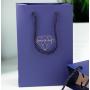 Handmade high quality guarantee gold stamping paper gift packaging bag with custom logo and handles