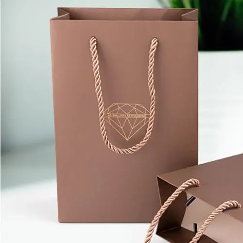 Handmade high quality guarantee gold stamping paper gift packaging bag with custom logo and handles Handmade high quality guarantee gold stamping paper gift packaging bag with custom logo and handles