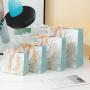 Wholesale Hot Selling Reasonable Good Quality Paper Bags Gift Packaging With Ribbon Tie Handle
