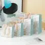 Wholesale Hot Selling Reasonable Good Quality Paper Bags Gift Packaging With Ribbon Tie Handle Wholesale Hot Selling Reasonable Good Quality Paper Bags Gift Packaging With Ribbon Tie Handle