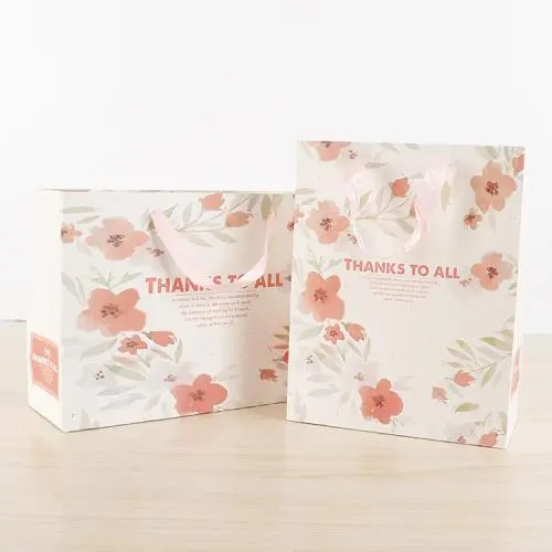 Sacs d’emballage cadeaux imprimés avec des fleurs romantiques et des couleurs, design nouveau, prix bas, avec logo personnalisé. Sacs d’emballage cadeaux imprimés avec des fleurs romantiques et des couleurs, design nouveau, prix bas, avec logo personnalisé.