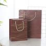 Wholesale Simple Delicate Gold Stamping Printed Paper Gift Packaging Bag With Custom Design Logo
