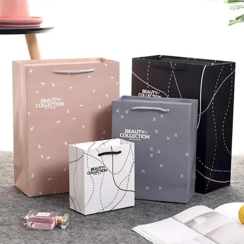 High Quality Recycled Reasonable Portable Paper Gift Bag Packaging With Custom Own Logo High Quality Recycled Reasonable Portable Paper Gift Bag Packaging With Custom Own Logo