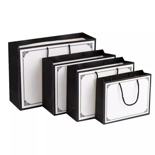 Fancy High Quality Paper Gift Bags For Clothing Shopping Packaging With Printing Design Own Logo Fancy High Quality Paper Gift Bags For Clothing Shopping Packaging With Printing Design Own Logo