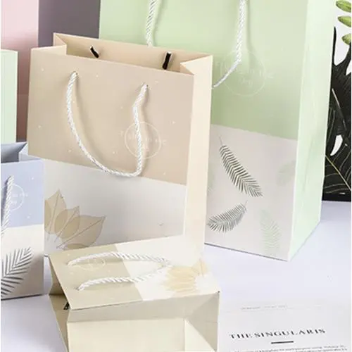 Manufacture factory low price hot sale reputable paper bag for gift packaging with custom own logo Manufacture factory low price hot sale reputable paper bag for gift packaging with custom own logo