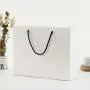 Luxury Fancy Portable White Shopping Paper Ivory Board Gift Bags Packaging With Your Own Logo Luxury Fancy Portable White Shopping Paper Ivory Board Gift Bags Packaging With Your Own Logo