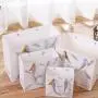 Großhandel Maßgeschneiderte Logo-Druck Wiederverwendbare Tragbare Papier Geschenkpapiertüten