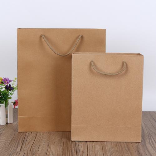 China Manufacturer Custom Logo Brown Kraft Paper Packaging Bags Shopping Paper Bags With Handles