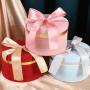 Wholesale high quality universal custom luxury round shaped rigid gift box packaging with ribbon ties