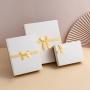 Luxury low price custom logo fancy cardboard personalised  t-shirt packaging box with ribbon ties