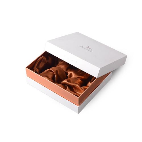 Hot-selling Luxury white rigid cardboard fancy reasonable  gift packaging box custom  logo with delicate  handle