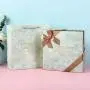 Boîte d'emballage commerciale de luxe haut de gamme en carton sur mesure avec ruban et nœud. Boîte d'emballage commerciale de luxe haut de gamme en carton sur mesure avec ruban et nœud.