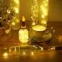 Decorman Weinflaschen Korkleuchten mit Kerzenflamm 10er Pack 20 LED Warme Weiß Batteriebetriebene Kupferdraht Sterne Lichter Mini Funkeln Lichter für Party, Hochzeit, Weihnachten, Halloween (Warme Weiß)